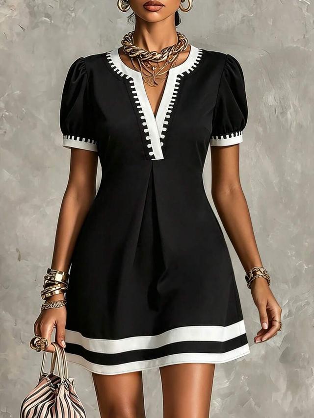black and white contrast trim puff sleeve dress