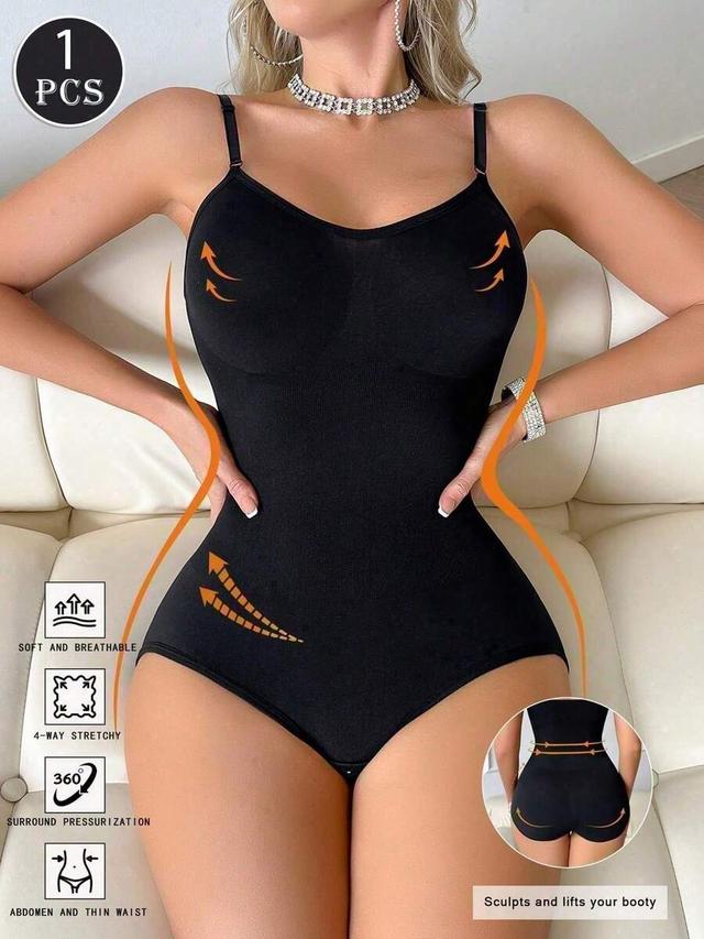 minimalist black compression bodysuit with tummy control