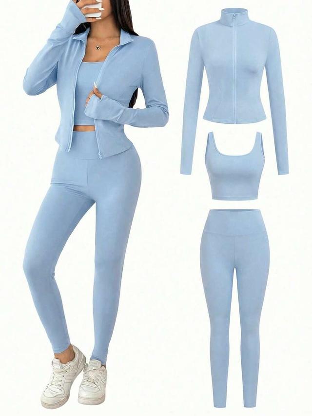 light blue zip-up jacket, tank top, and leggings set