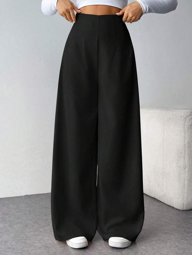 minimalist high waist textured wide leg trousers