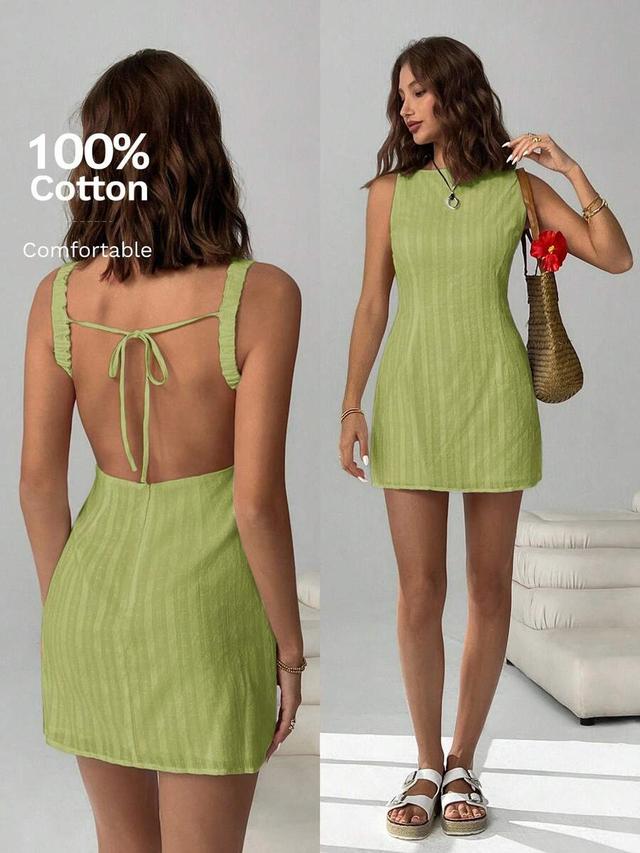 light green textured open back mini dress