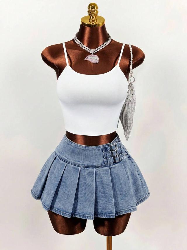 white pleated denim mini skirt with buckle detail