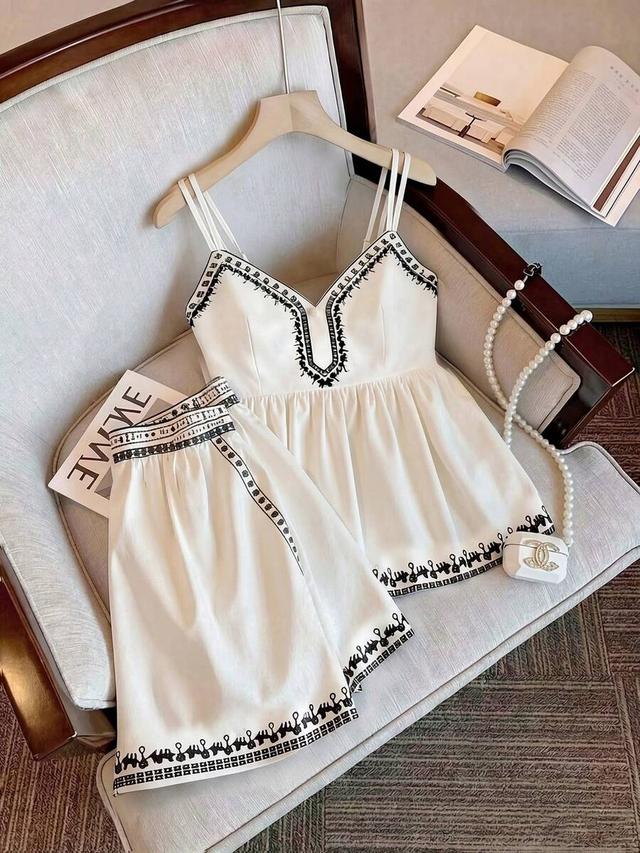 white v-neck camisole and matching wide-leg shorts set