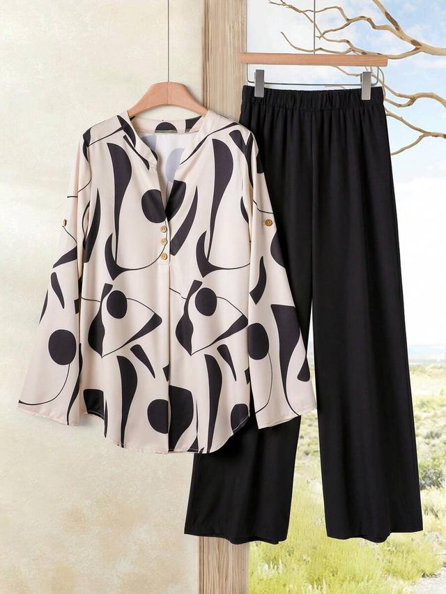 beige and black abstract print long sleeve blouse