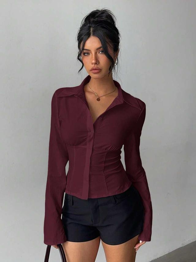 burgundy pleated waist long sleeve button-up shirt