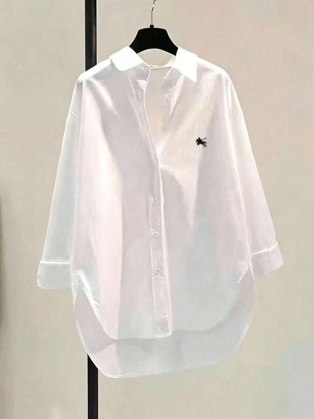 women's white embroidered button-up shirt