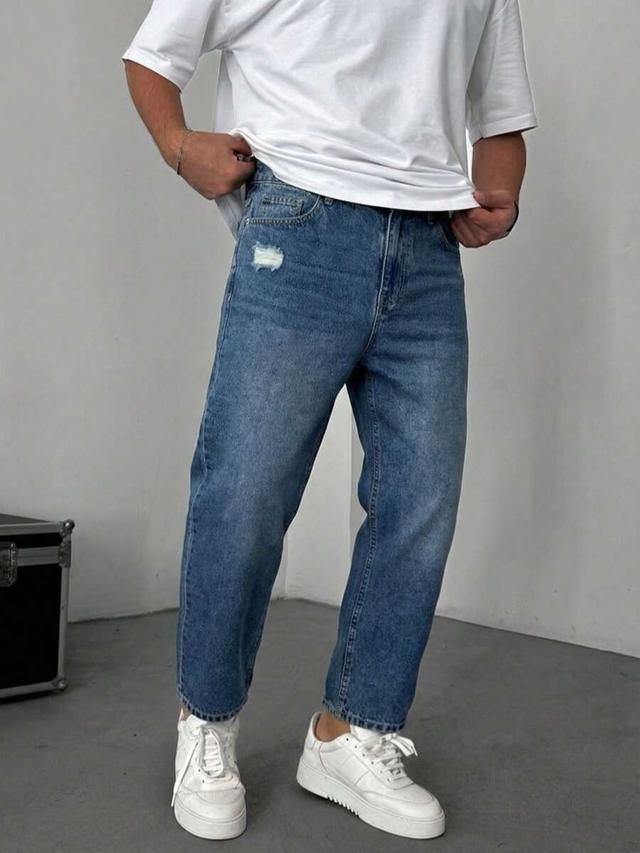 distressed vintage washed dark blue denim flare jeans