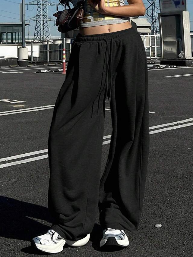 solid black loose pleated thermal lined sweatpants