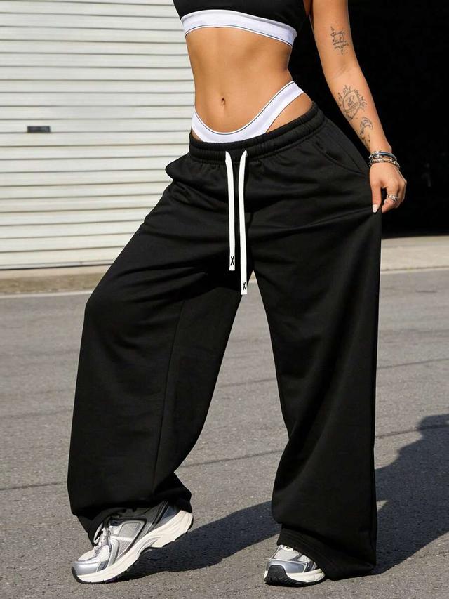 women's black drawstring waist wide leg sweatpants