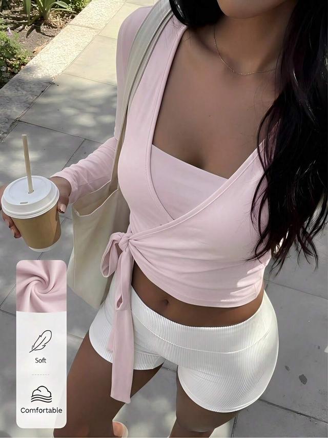 light pink v-neck long sleeve wrap cropped top