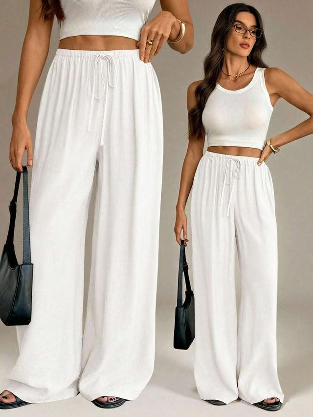 white casual high-waisted wide leg trousers