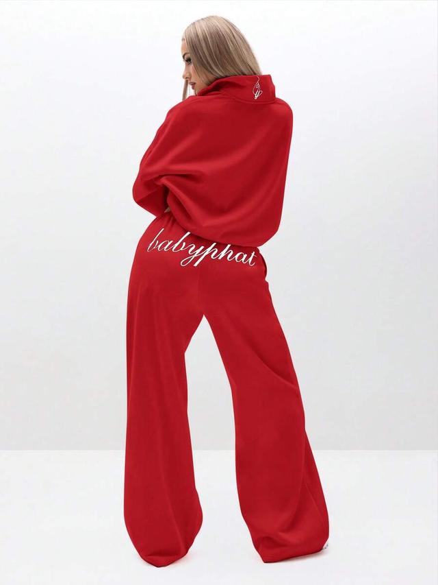 red baggy fleece sweatpants with embroidered logo