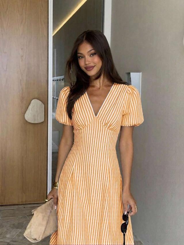 elegant orange striped v-neck mid-length dress