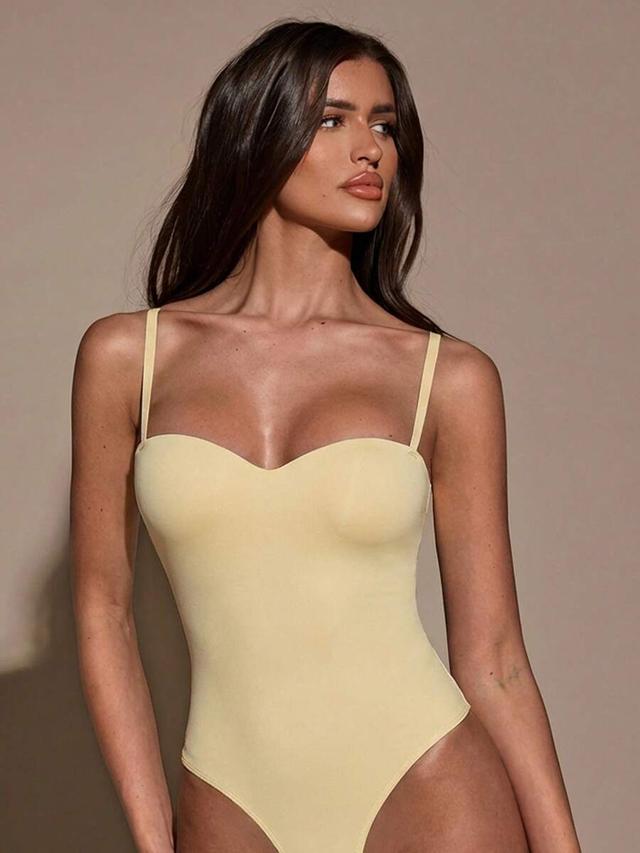 solid yellow sleeveless basic bodysuit