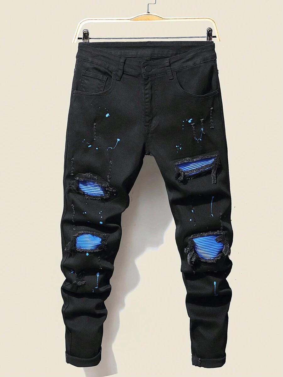black cotton jeans with splash ink and ripped details