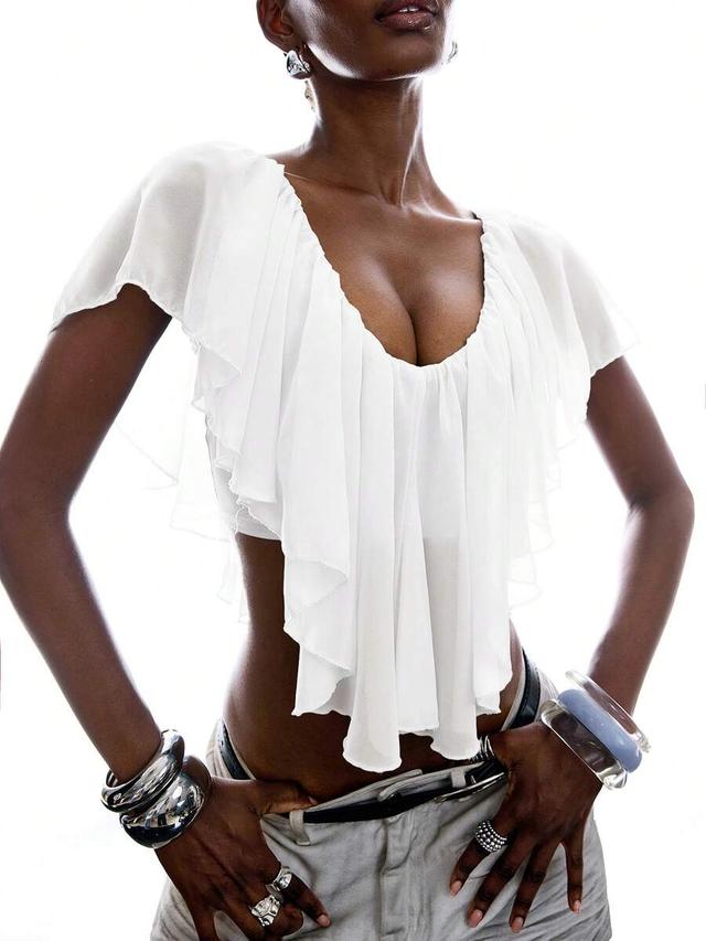 minimalist white ruffle asymmetric hem blouse