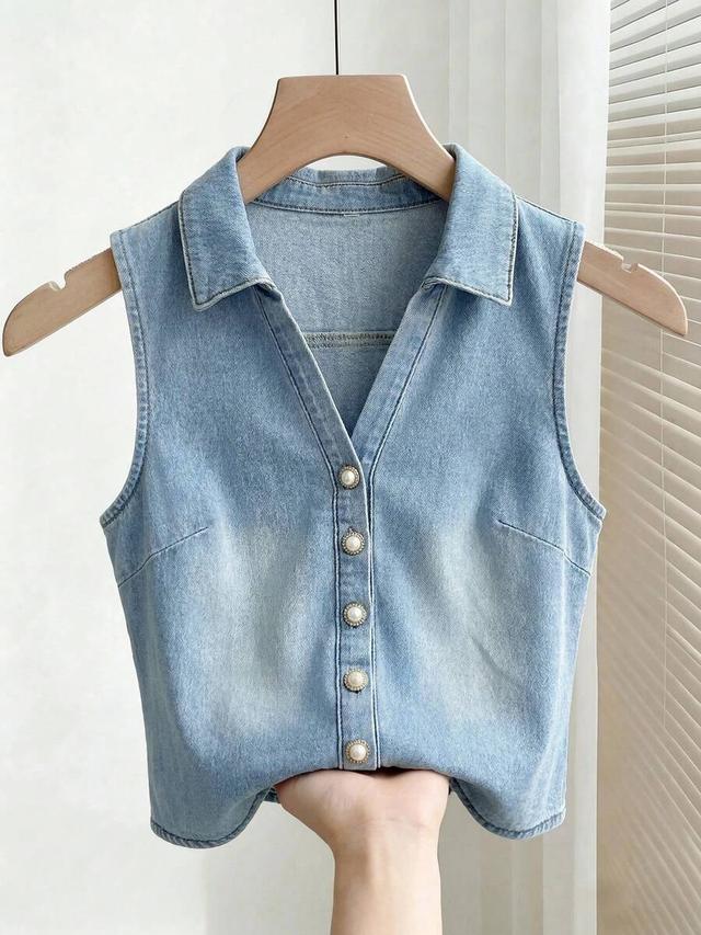 light wash denim vest with faux pearl buttons
