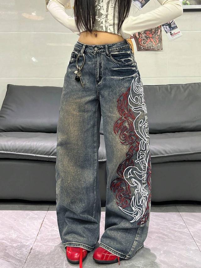 acid wash wide leg jeans with tribal embroidery