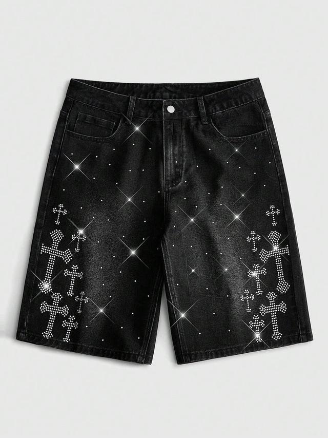 washed black denim shorts with rhinestone cross embellishments