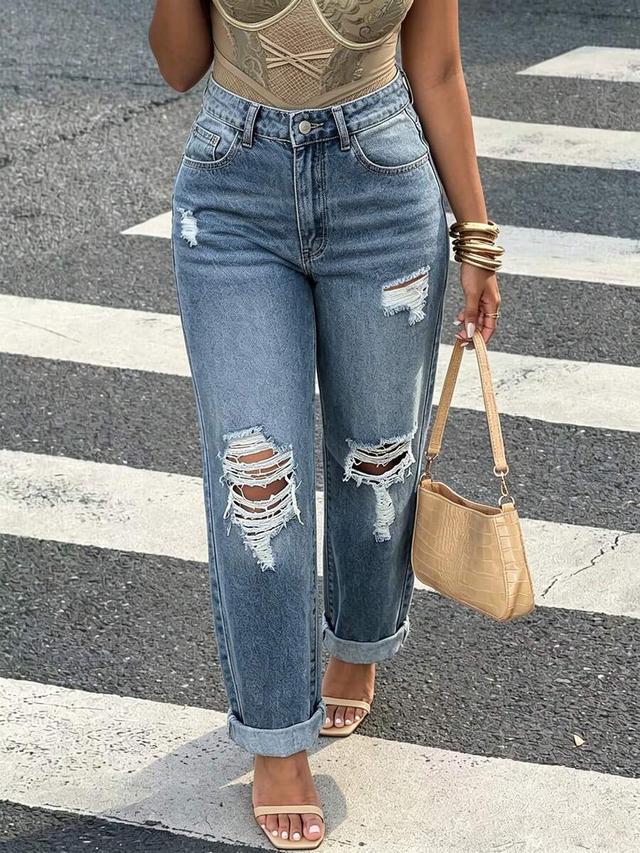 distressed light wash relaxed fit denim jeans