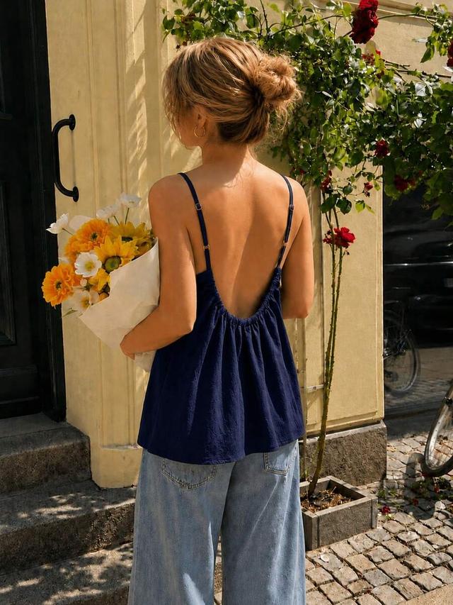 navy blue textured flowy low back camisole top