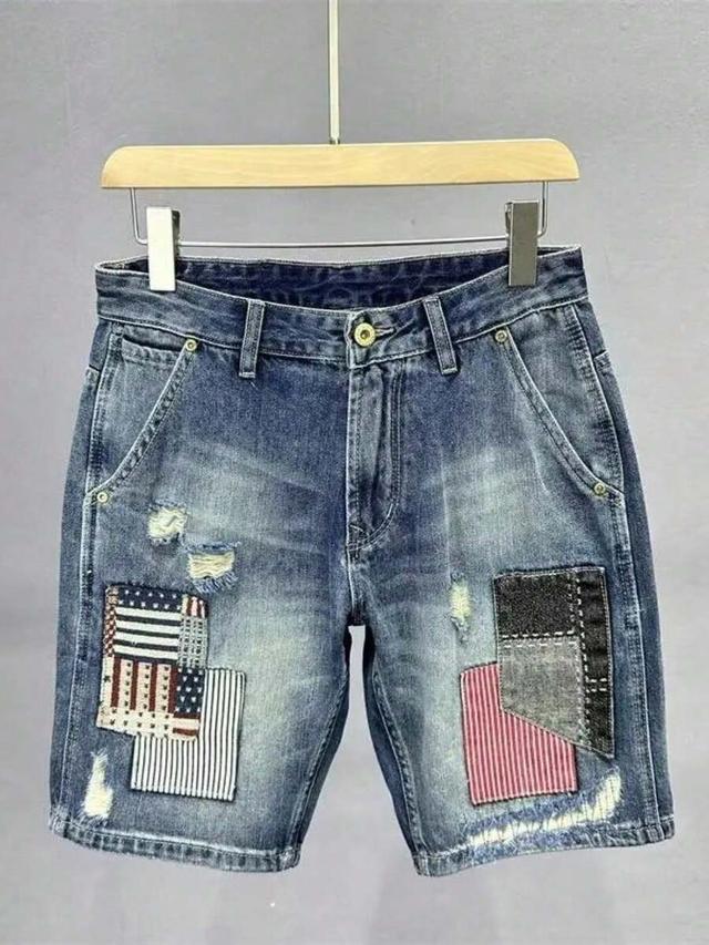 spliced denim shorts with contrast patch and ripped detail
