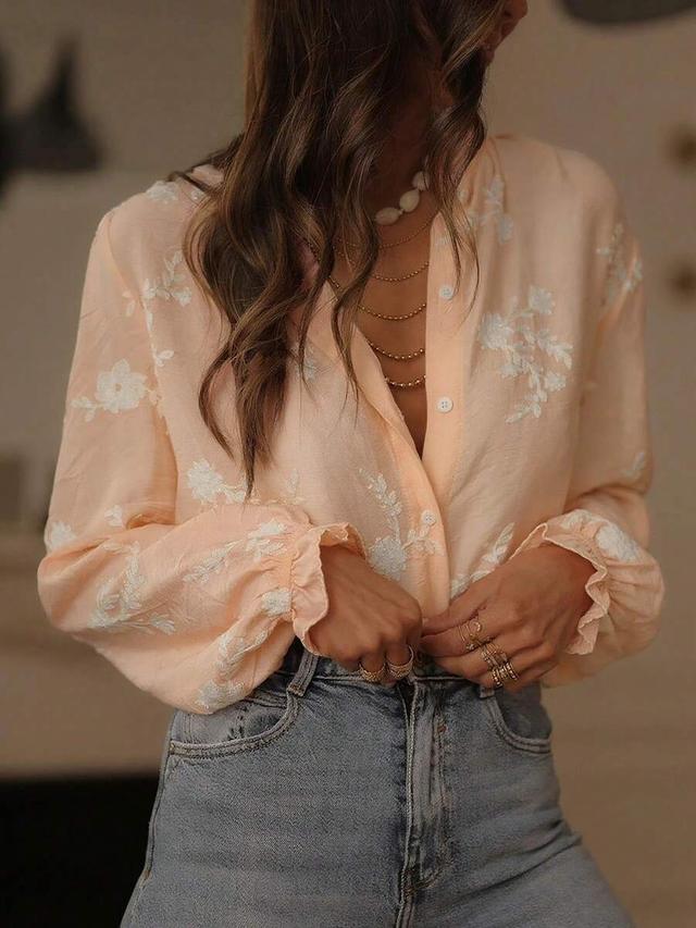 peach floral embroidered buttoned blouse with ruffle cuffs