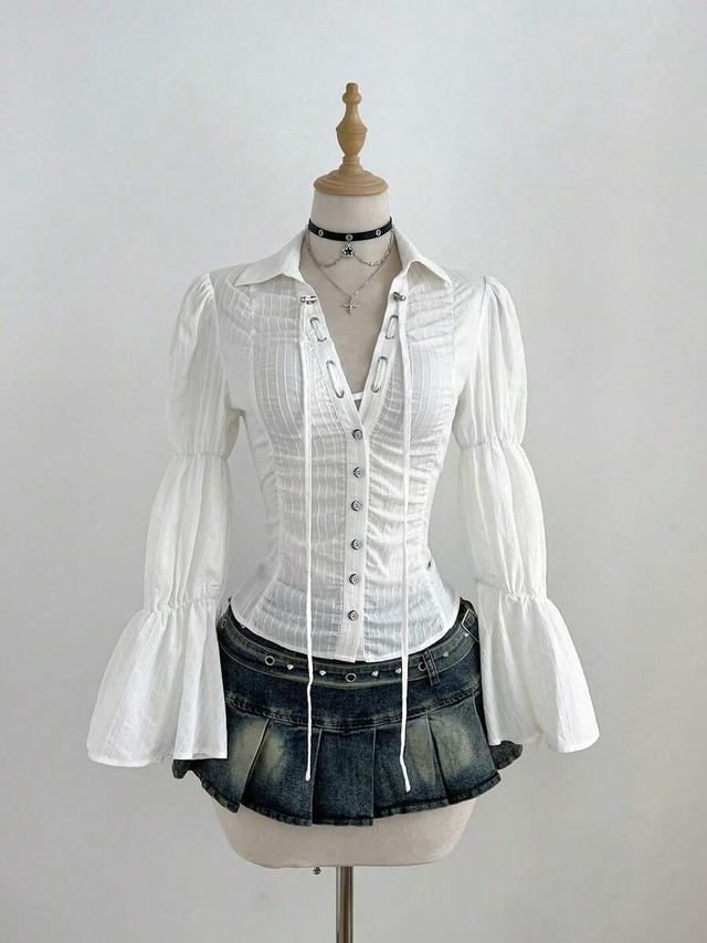 textured white long sleeve shirt with lace-up detail