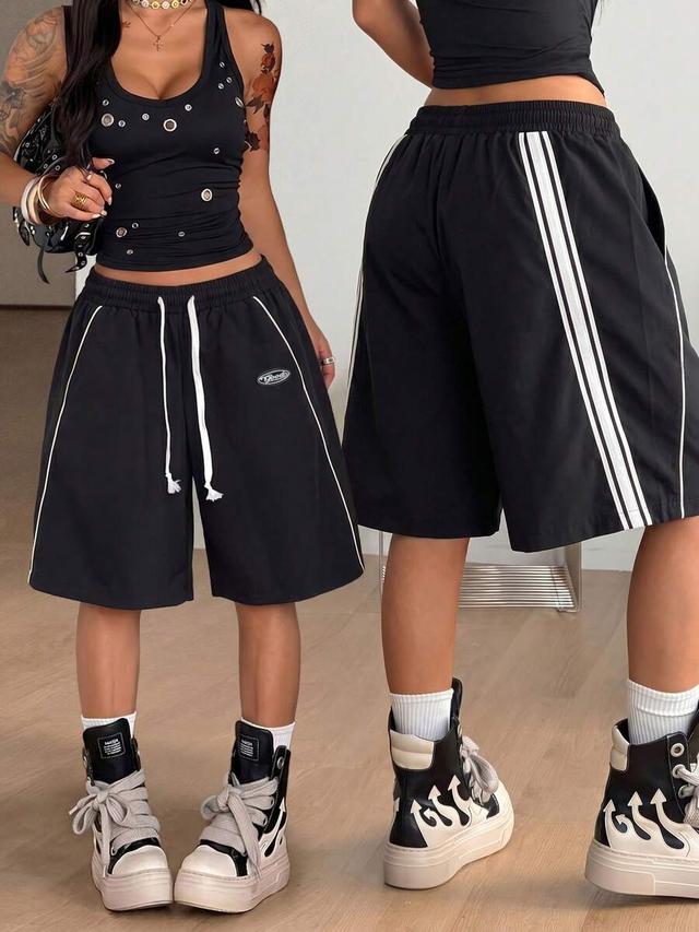 black breathable mesh track shorts with side stripes
