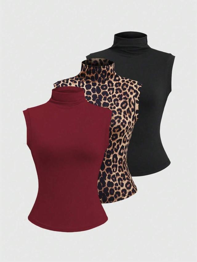 black slim fit sleeveless mock neck knit top