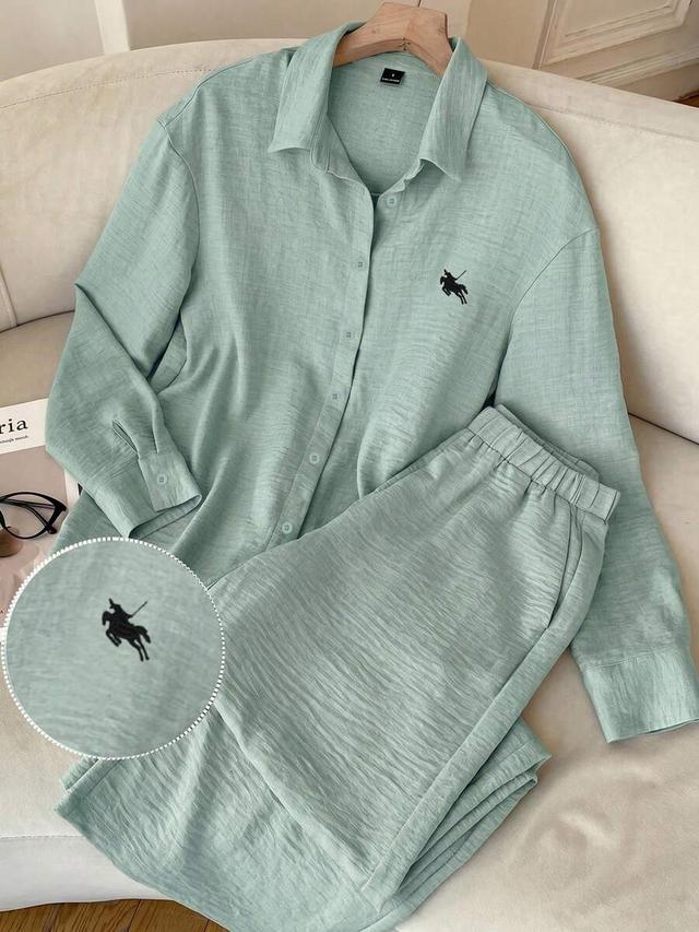light green woven button-front long sleeve shirt