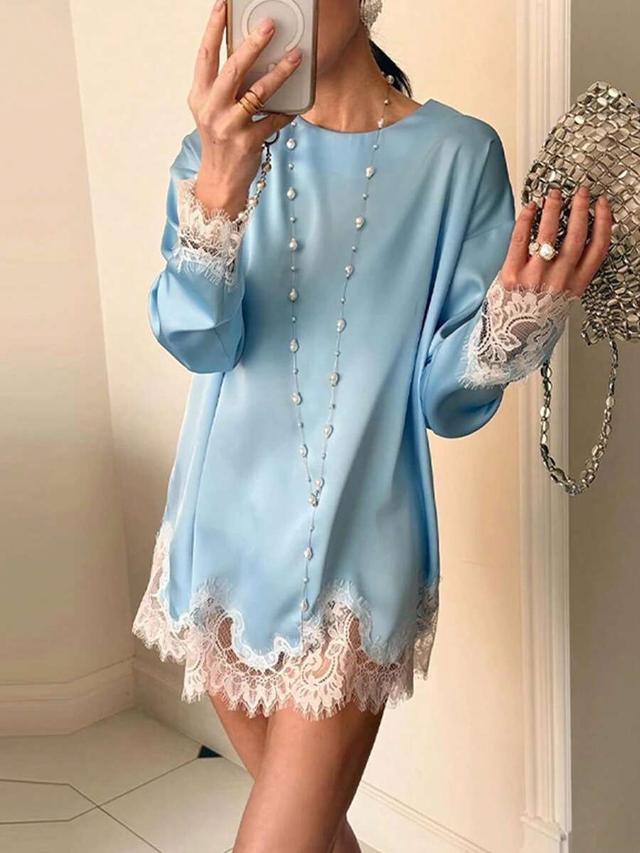 light blue satin blouse with lace patchwork trim