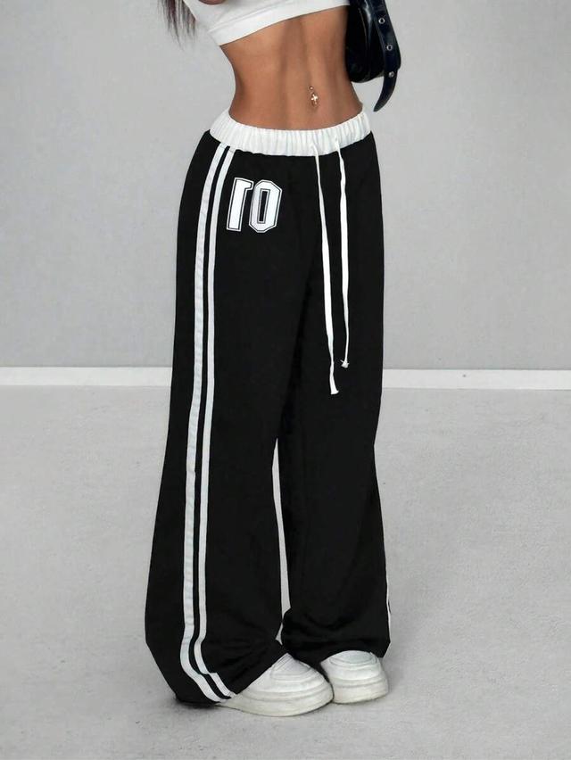 black and white numeric print retro sweatpants