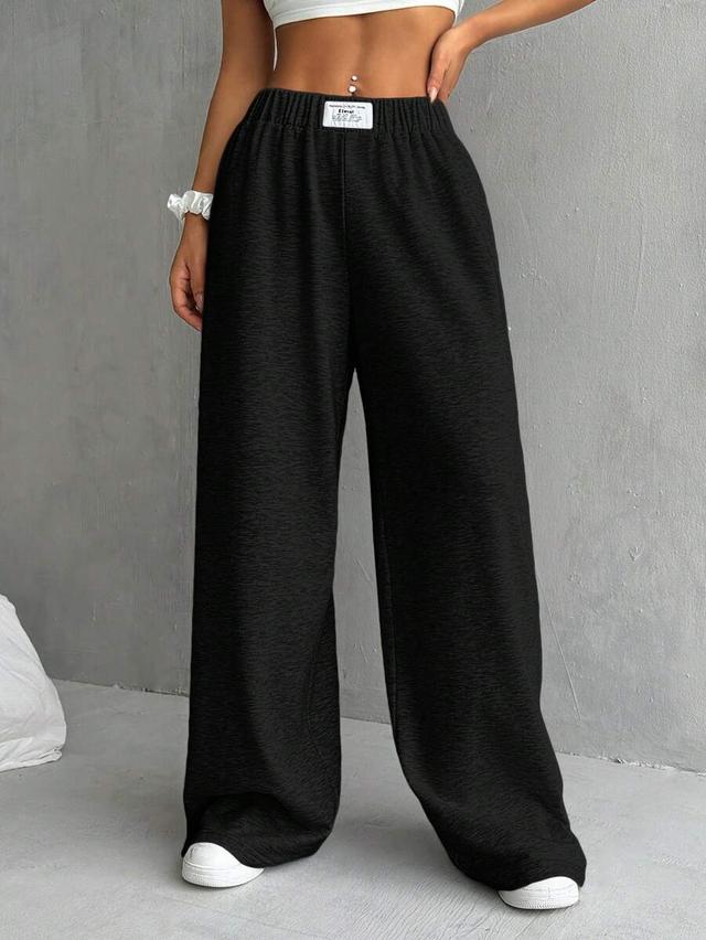 black casual wide-leg sweatpants with patch