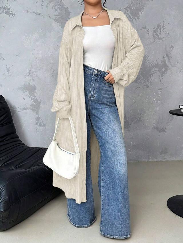 beige long textured casual button-up shirt