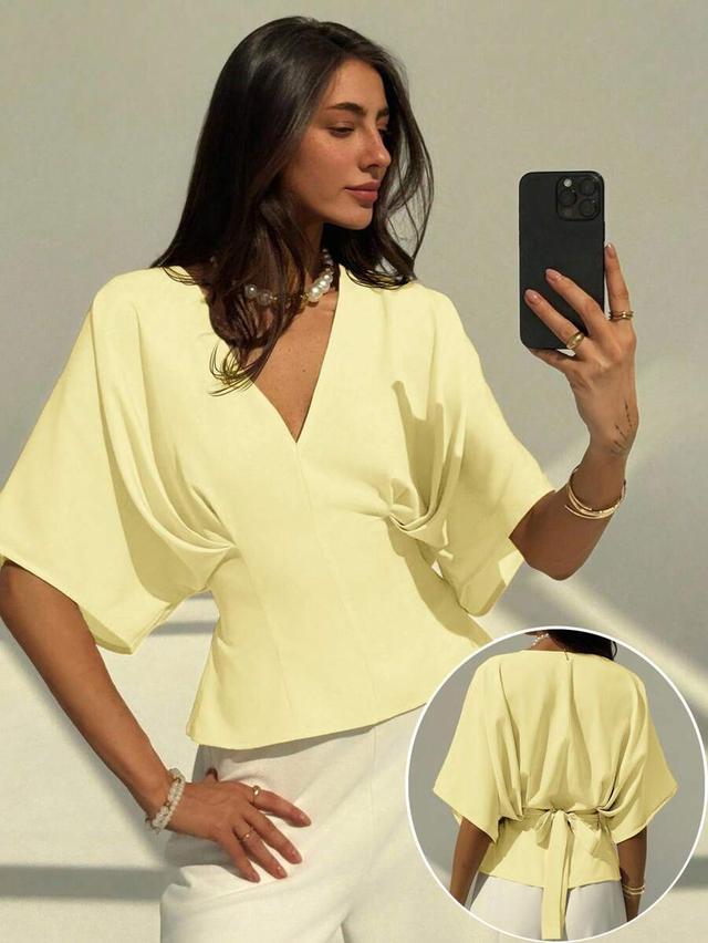 elegant solid peach loose fitting short sleeve blouse