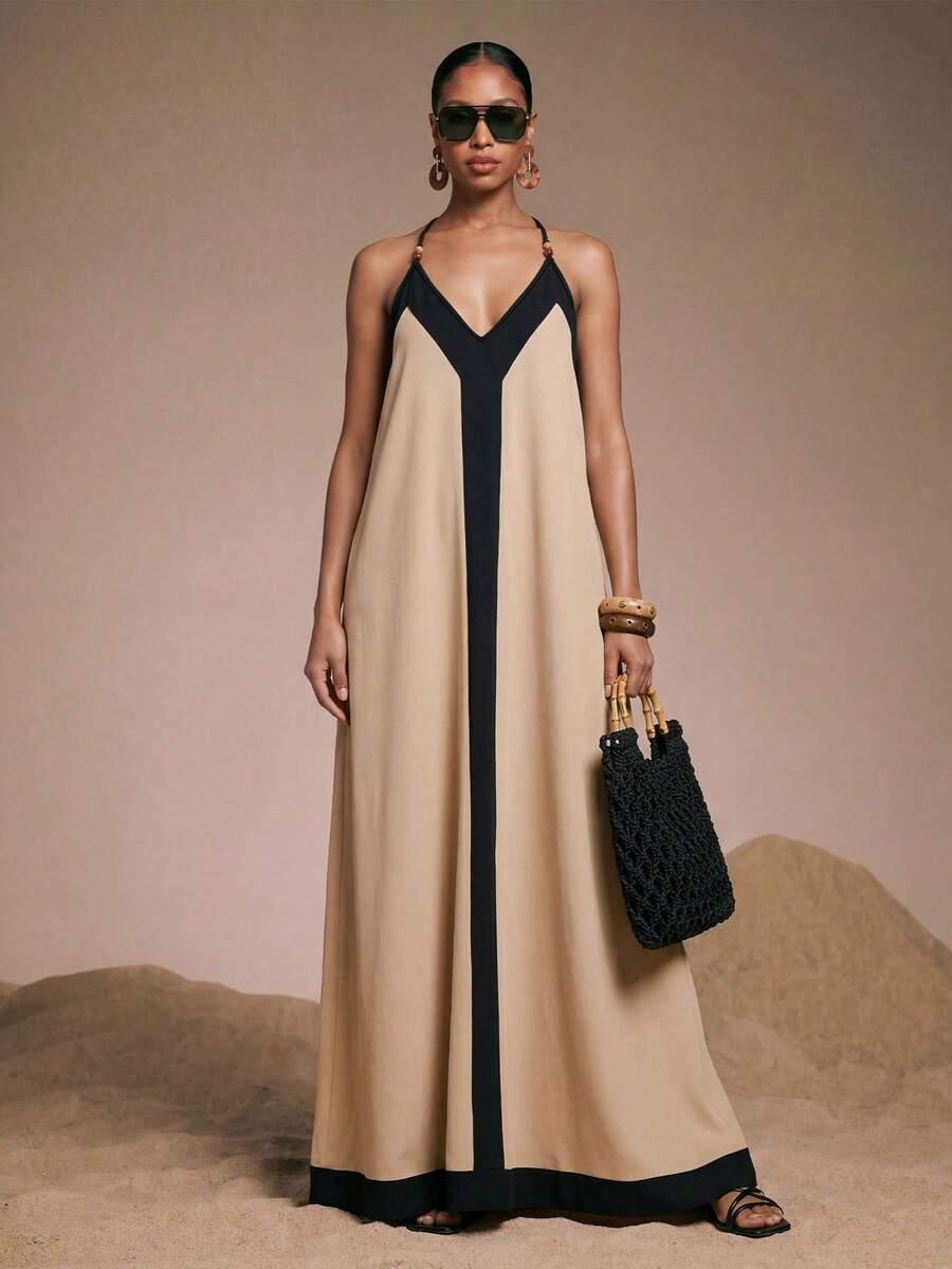 colorblocked beige and black maxi dress