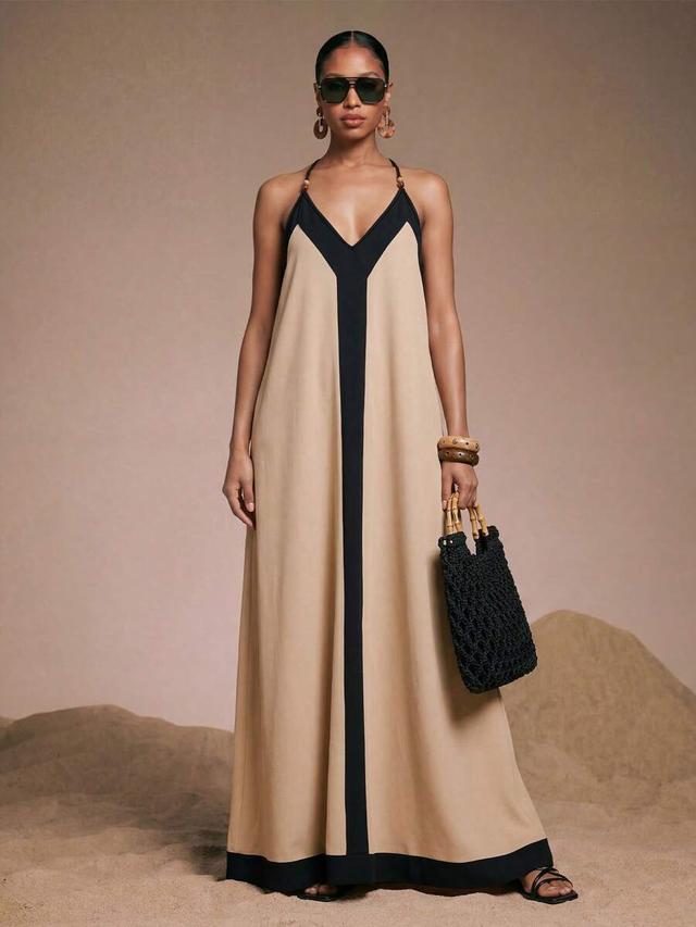 colorblocked beige and black maxi dress