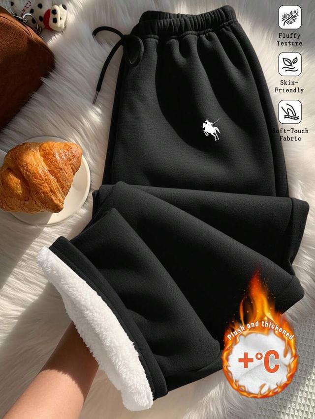black thermal lined pony print loose sweatpants