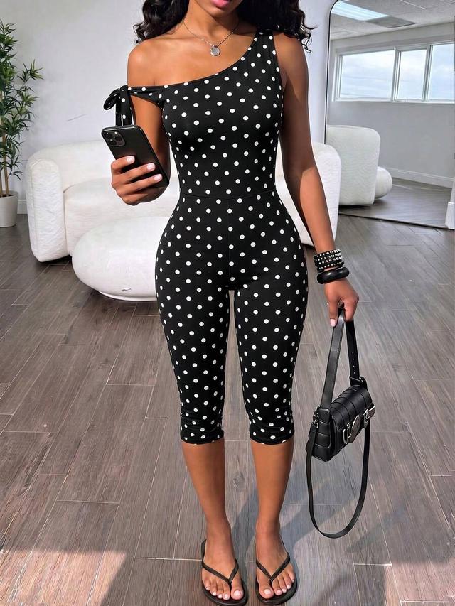 black and white polka dot one-shoulder jumpsuit