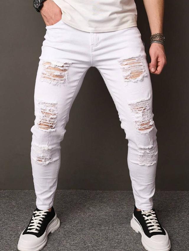 white slim fit ripped denim jeans