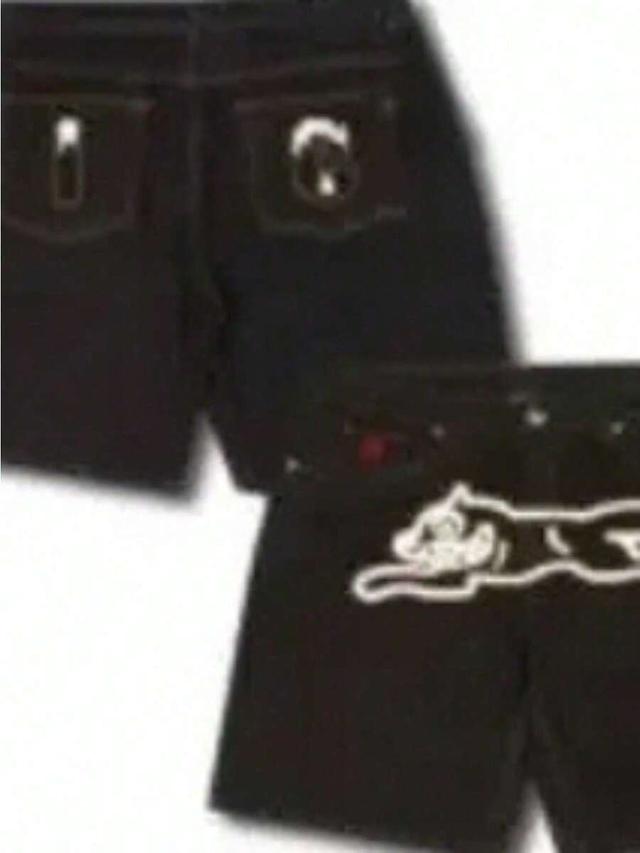 dark black shorts with flying dog graphic print
