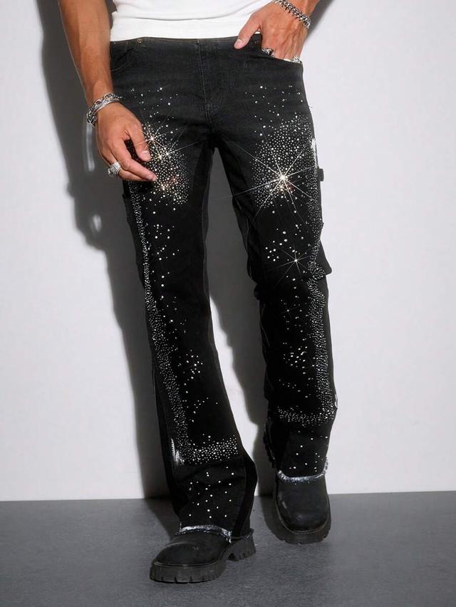 black denim jeans with rhinestone patch pocket detailing