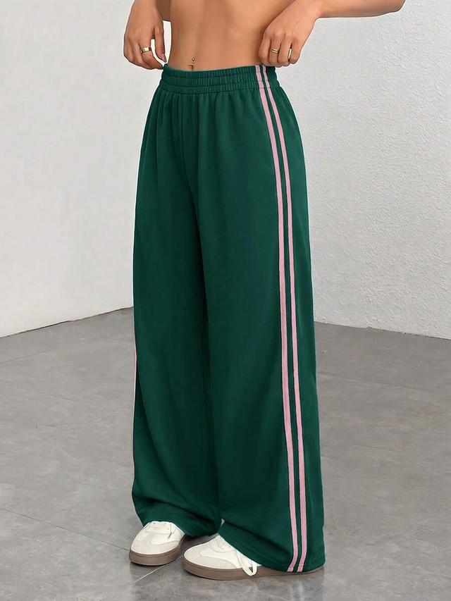 green casual activewear sweatpants with pink side stripes