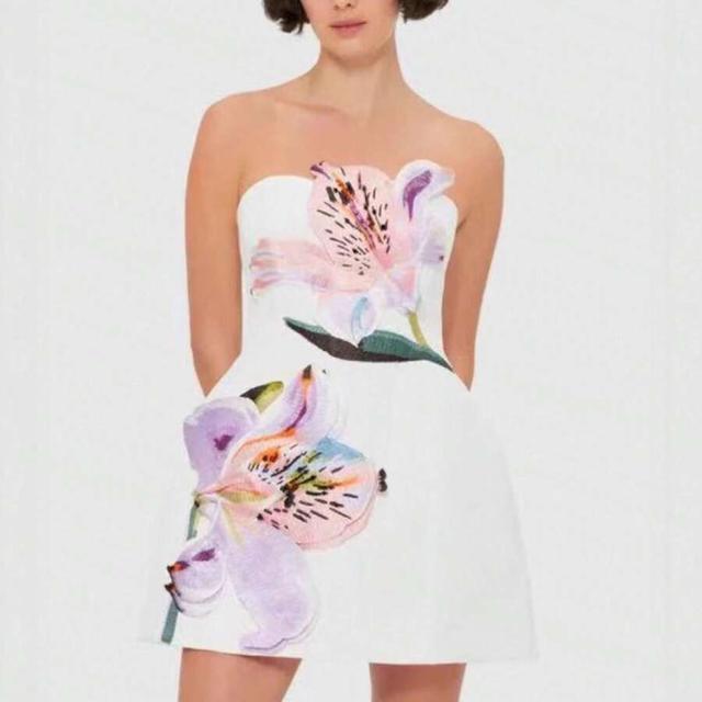 white strapless mini dress with large floral embroidery