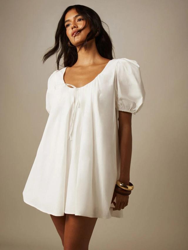 white puff sleeve smock mini dress with tie front