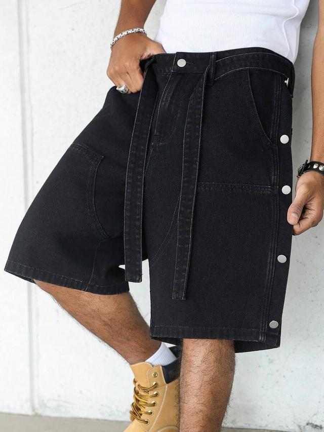 black patchwork denim shorts with side snap buttons