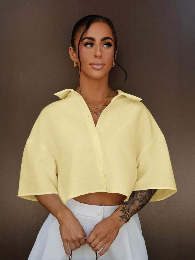 yellow woven cropped short sleeve blouse