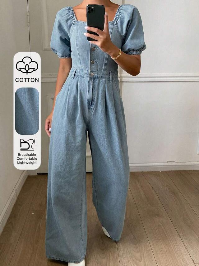 light wash denim short sleeve jumpsuit with cinched waist