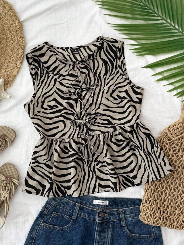 zebra striped printed chiffon peplum hem tank top